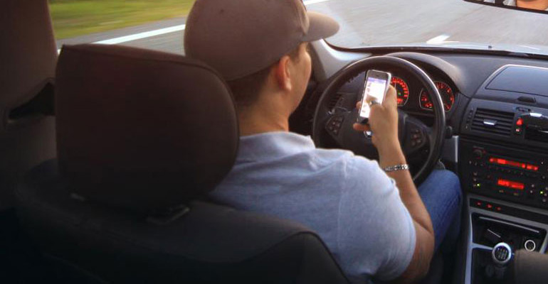 Road Traffic Law use mobile phone while driving